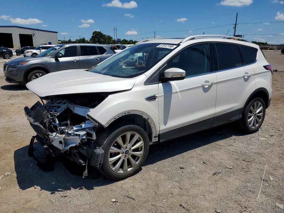 FORD ESCAPE 2018 with VIN 1FMCU9J95JUC75825 - Photo from auction