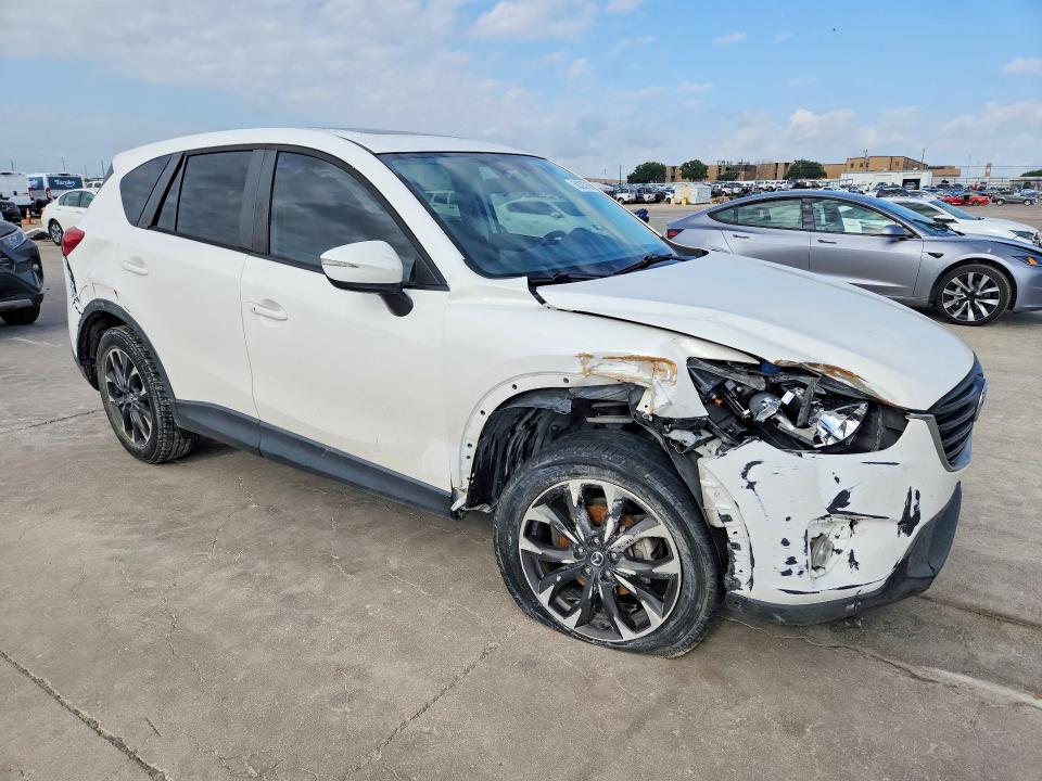 Photo 4 from auction – 2016 MAZDA CX-5 with VIN JM3KE2DY8G0852376
