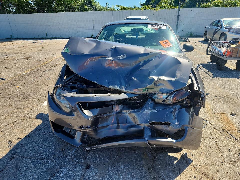 Photo 5 from auction – 2003 FORD ESCORT with VIN 3FAFP11343R150580