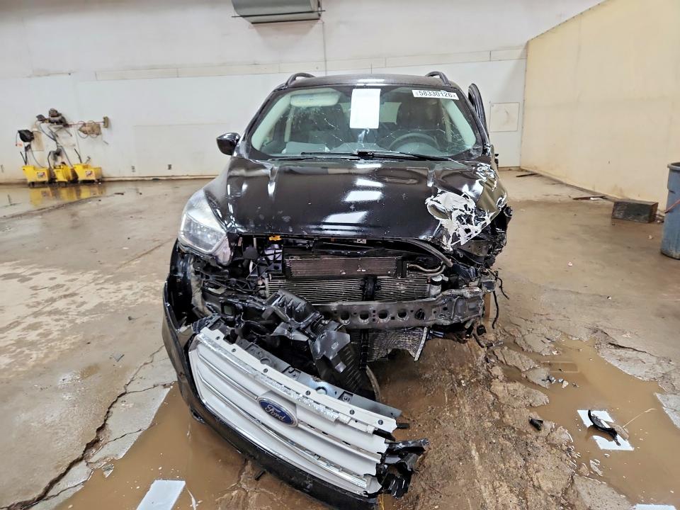 Photo 5 from auction – 2018 FORD ESCAPE with VIN 1FMCU9GD1JUC05069