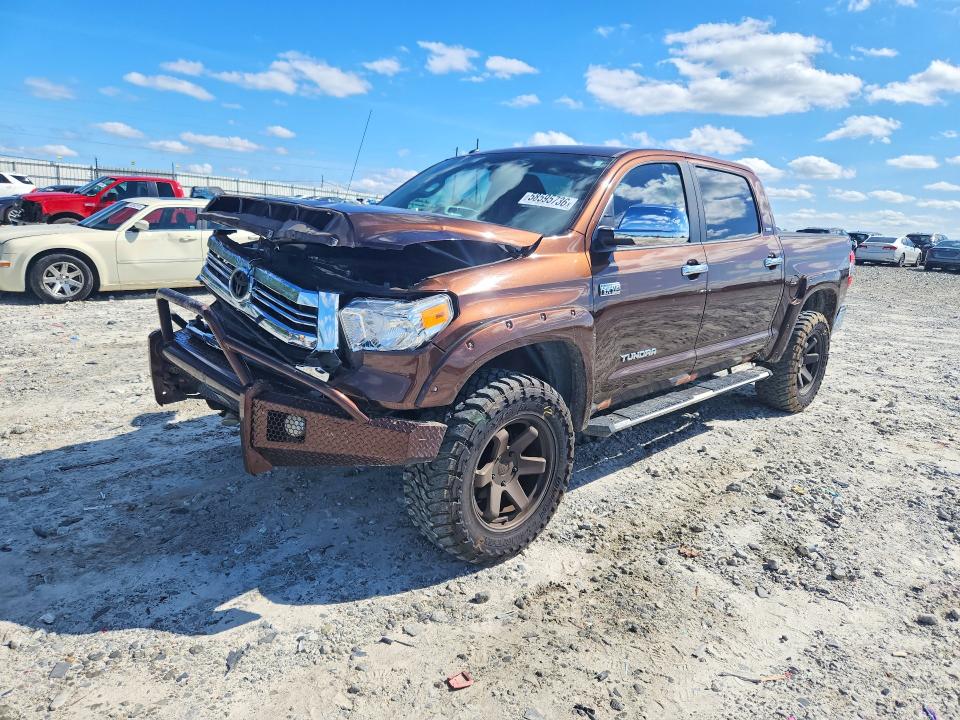 TOYOTA TUNDRA 2016 with VIN 5TFDW5F11GX520593 - Photo from auction