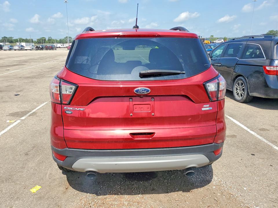 Photo 6 from auction – 2018 FORD ESCAPE with VIN 1FMCU9GD3JUC33598