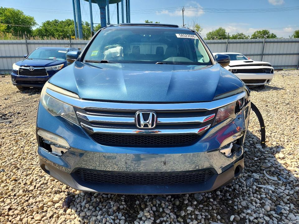 Photo 5 from auction – 2016 HONDA PILOT with VIN 5FNYF6H54GB008943