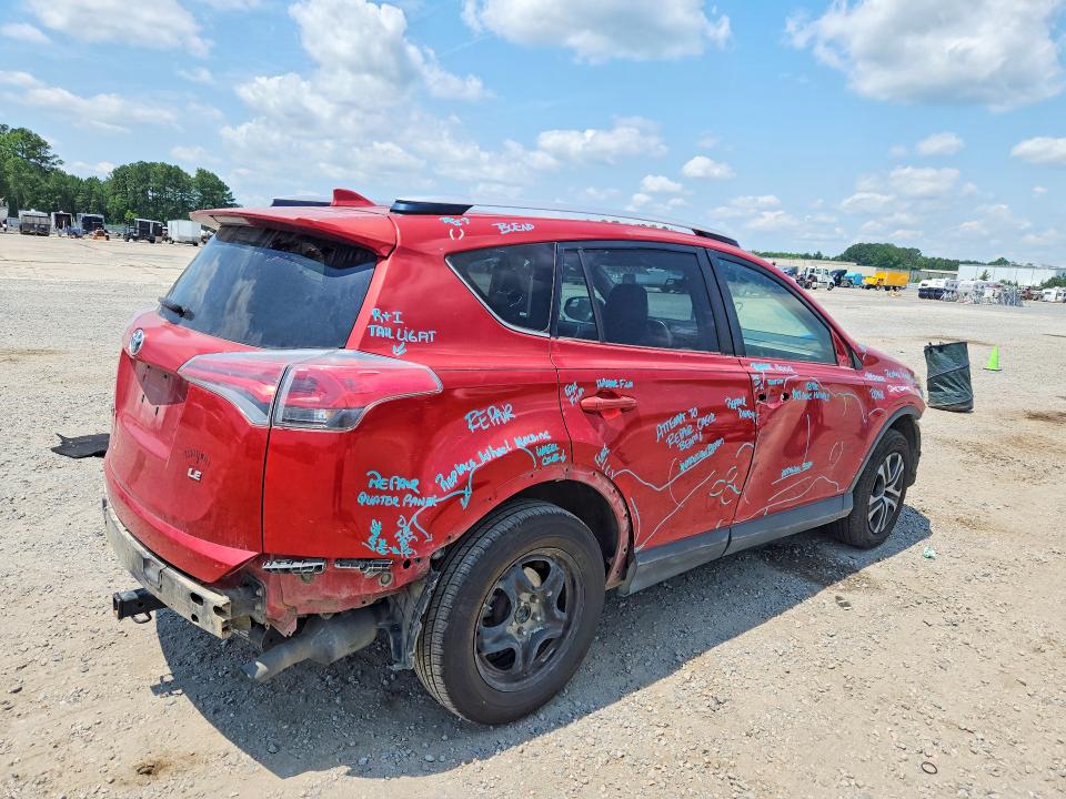 Photo 3 from auction – 2016 TOYOTA RAV4 with VIN JTMZFREV2GJ083949