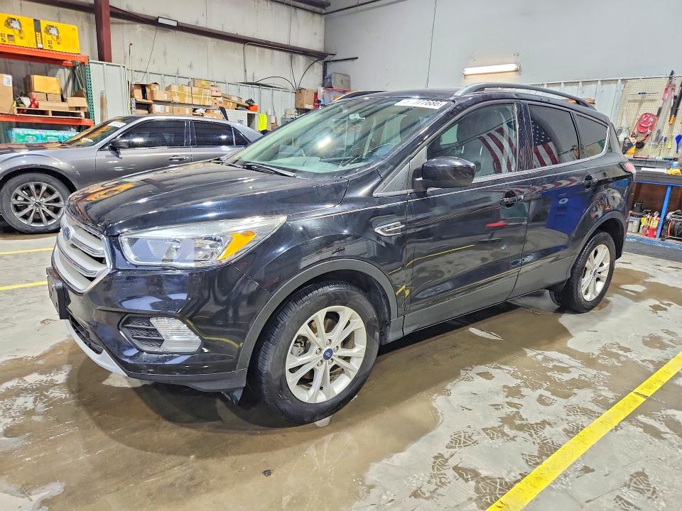 FORD ESCAPE 2018 with VIN 1FMCU0GD3JUB40723 - Photo from auction