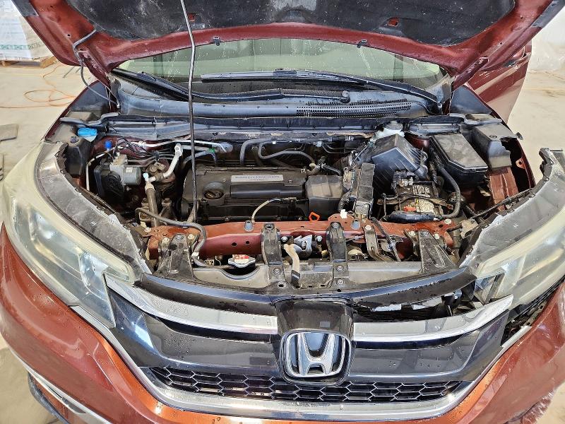 Photo 12 from auction – 2015 HONDA CR-V with VIN 2HKRM4H79FH616456