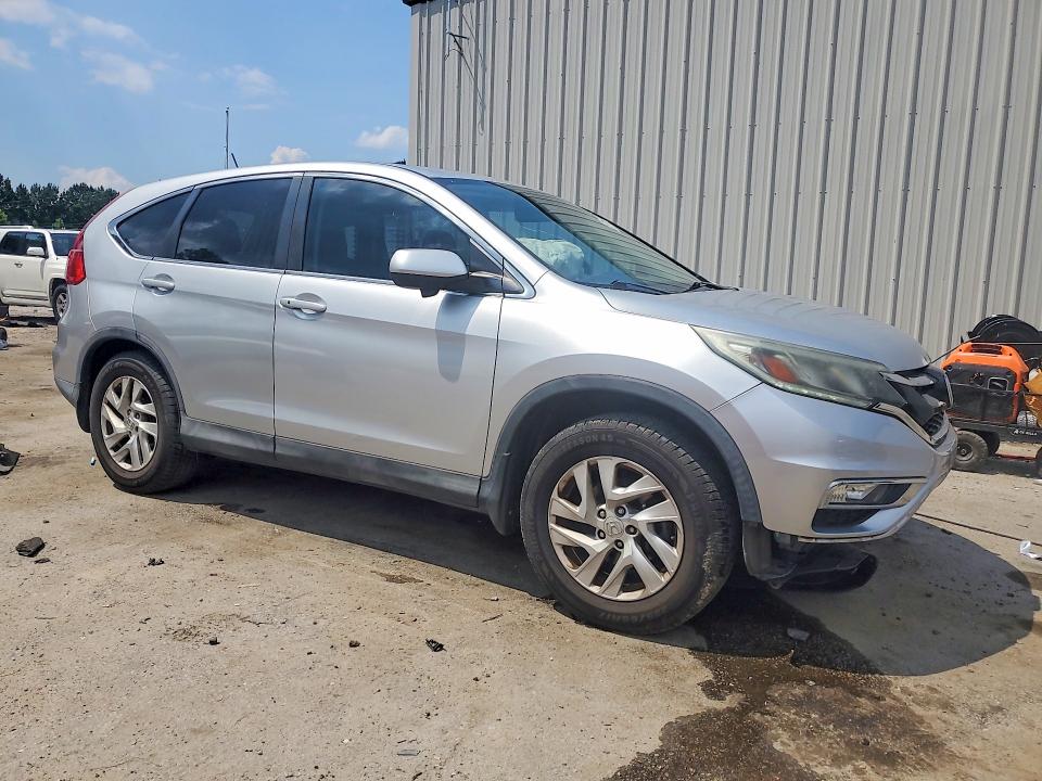 Photo 4 from auction – 2015 HONDA CR-V with VIN 2HKRM3H50FH552526