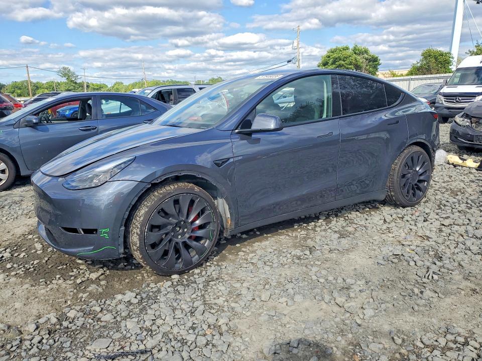 TESLA MODEL Y 2023 with VIN 7SAYGDEF4PF796799 - Photo from auction