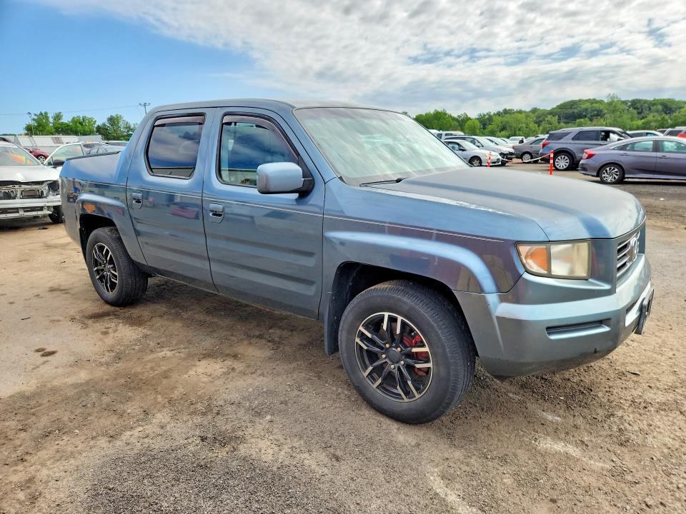 Снимка 4 от търг – 2006 HONDA RIDGELINE с VIN 2HJYK16586H517830