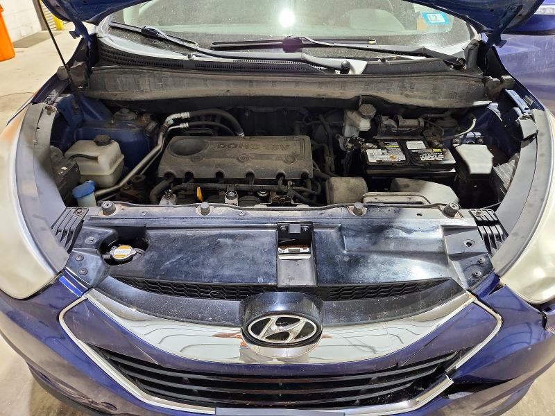 Photo 12 from auction – 2010 HYUNDAI TUCSON with VIN KM8JUCAC5AU024402