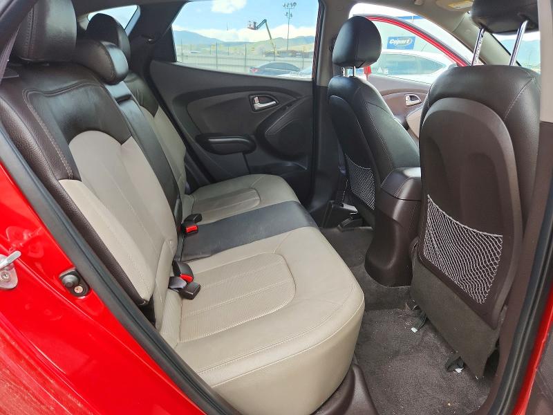 Photo 10 from auction – 2012 HYUNDAI TUCSON with VIN KM8JUCAC1CU542817