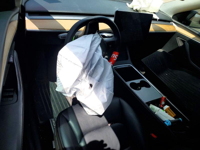 Photo 8 from auction – 2022 TESLA MODEL Y with VIN 7SAYGDEEXNA017035