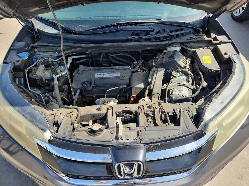 Photo 12 from auction – 2015 HONDA CR-V with VIN 3CZRM3H36FG710465
