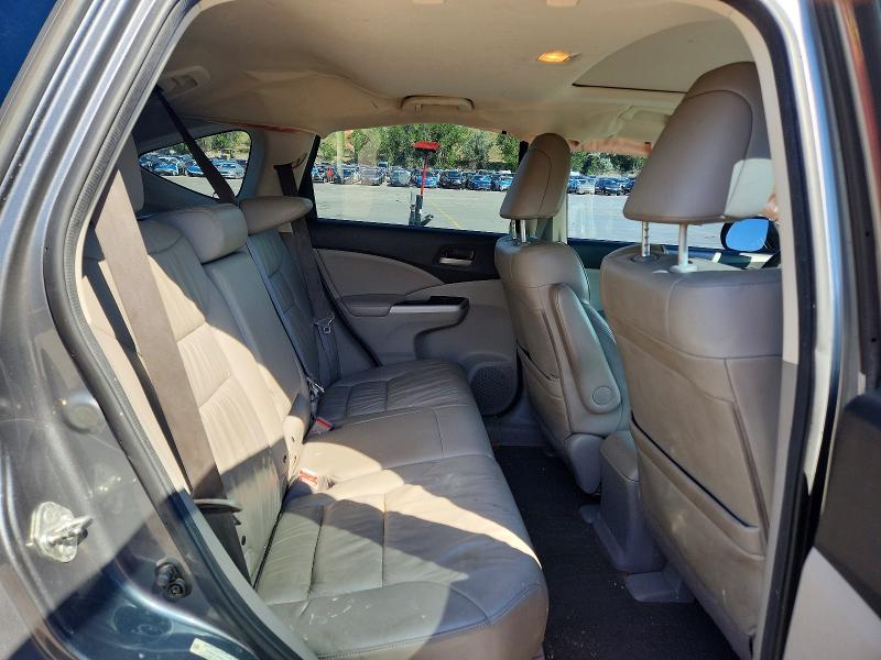 Photo 11 from auction – 2014 HONDA CR-V with VIN 2HKRM4H79EH650430