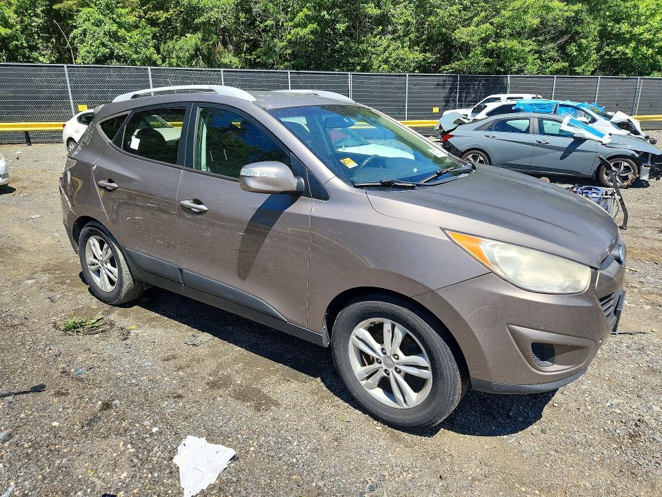 Photo 4 from auction – 2012 HYUNDAI TUCSON with VIN KM8JU3AC0CU339711