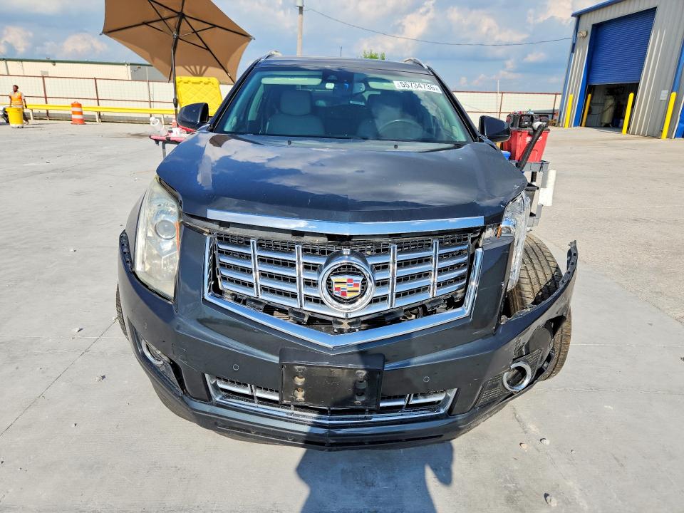 Photo 5 from auction – 2015 CADILLAC SRX with VIN 3GYFNDE37FS528605