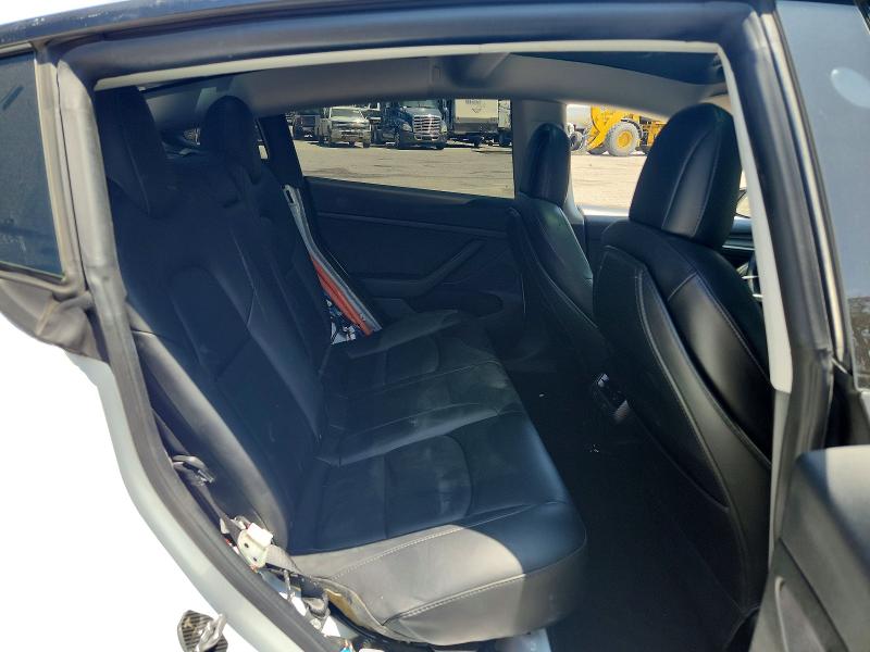 Photo 11 from auction – 2021 TESLA MODEL 3 with VIN 5YJ3E1EC5MF064937