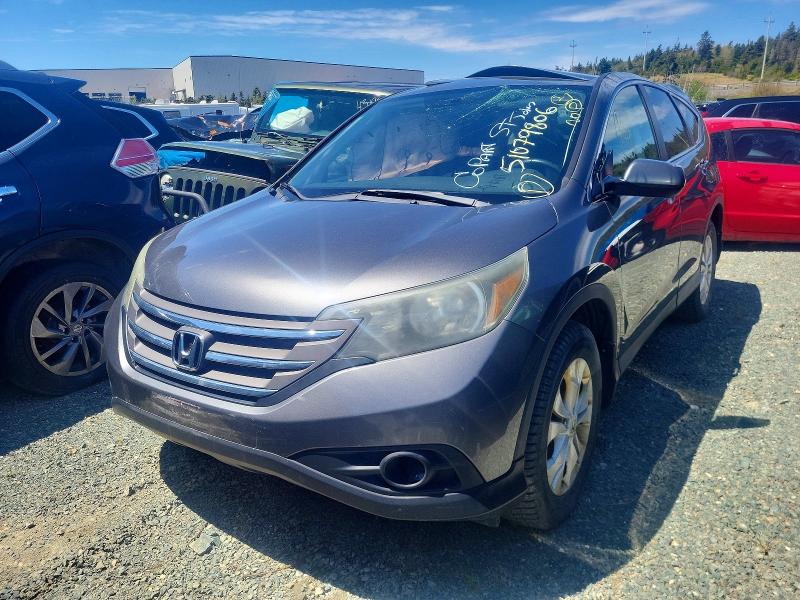 HONDA CR-V 2014 with VIN 2HKRM4H73EH129333 - Photo from auction