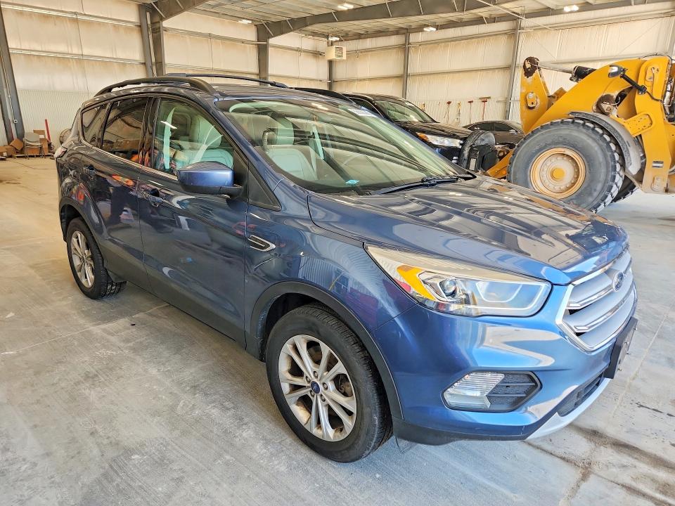 Photo 4 from auction – 2018 FORD ESCAPE with VIN 1FMCU9HD5JUC59635