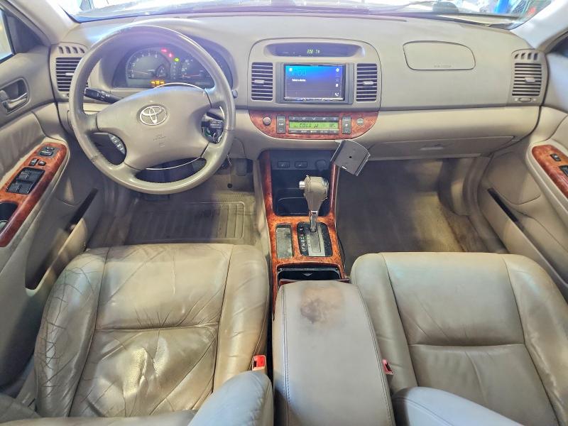 Photo 8 from auction – 2002 TOYOTA CAMRY with VIN JTDBF30KX20002853