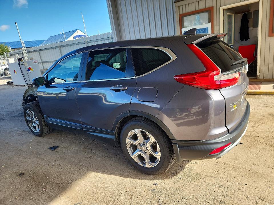 Photo 2 from auction – 2017 HONDA CR-V with VIN 2HKRW2H8XHH668009