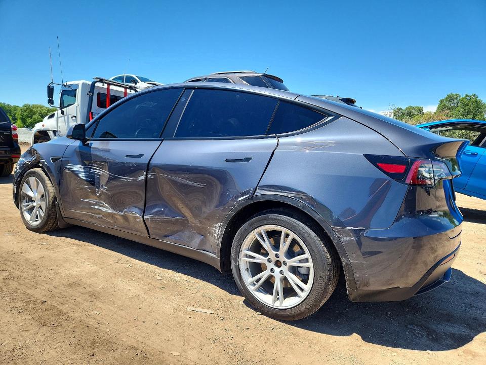 Photo 2 from auction – 2021 TESLA MODEL Y with VIN 5YJYGDEE3MF160567