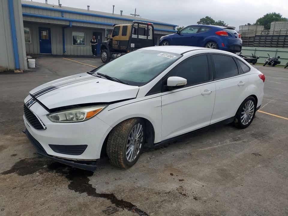 FORD FOCUS 2015 with VIN 1FADP3F22FL354428 - Photo from auction