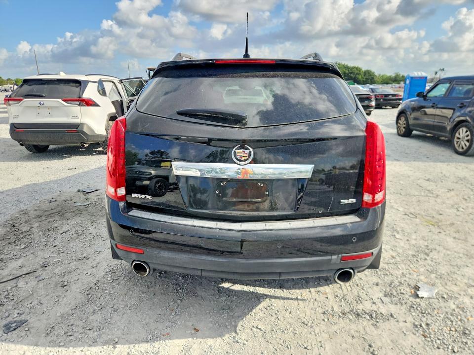 Photo 6 from auction – 2014 CADILLAC SRX with VIN 3GYFNBE31ES523046