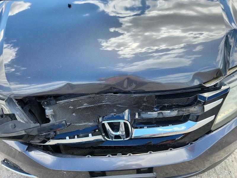 Photo 12 from auction – 2014 HONDA ODYSSEY with VIN 5FNRL5H65EB130949