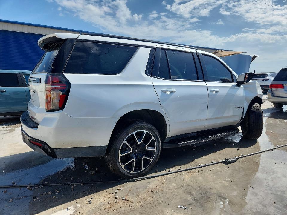 Photo 3 from auction – 2023 CHEVROLET TAHOE with VIN 1GNSCRKD0PR376375