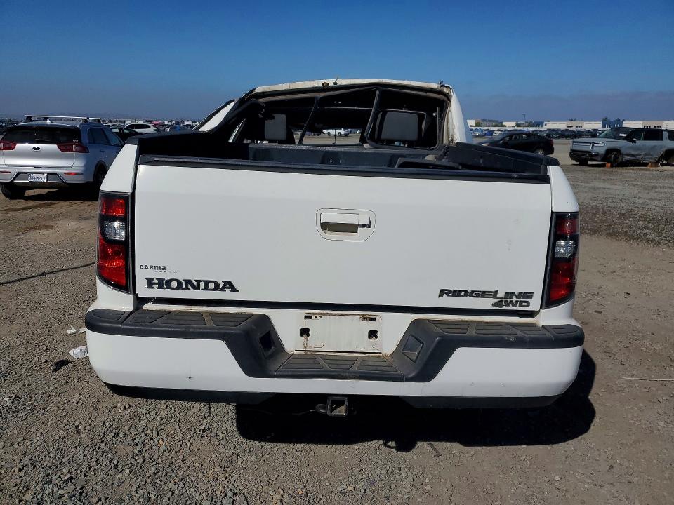 Photo 6 from auction – 2013 HONDA RIDGELINE with VIN 5FPYK1F70DB012736