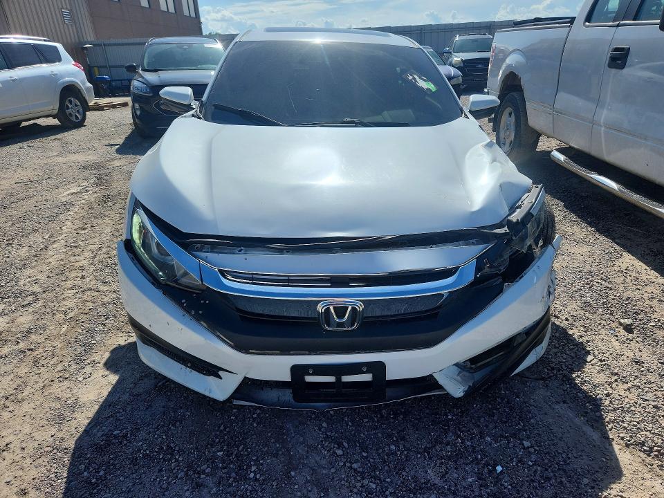 Foto 5 de la subasta – 2018 HONDA CIVC con VIN 2HGFC2F72JH557024