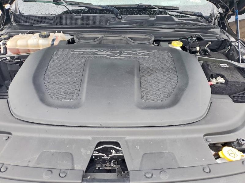 Photo 11 from auction – 2023 RAM 1500 with VIN 1C6SRFU95PN558697