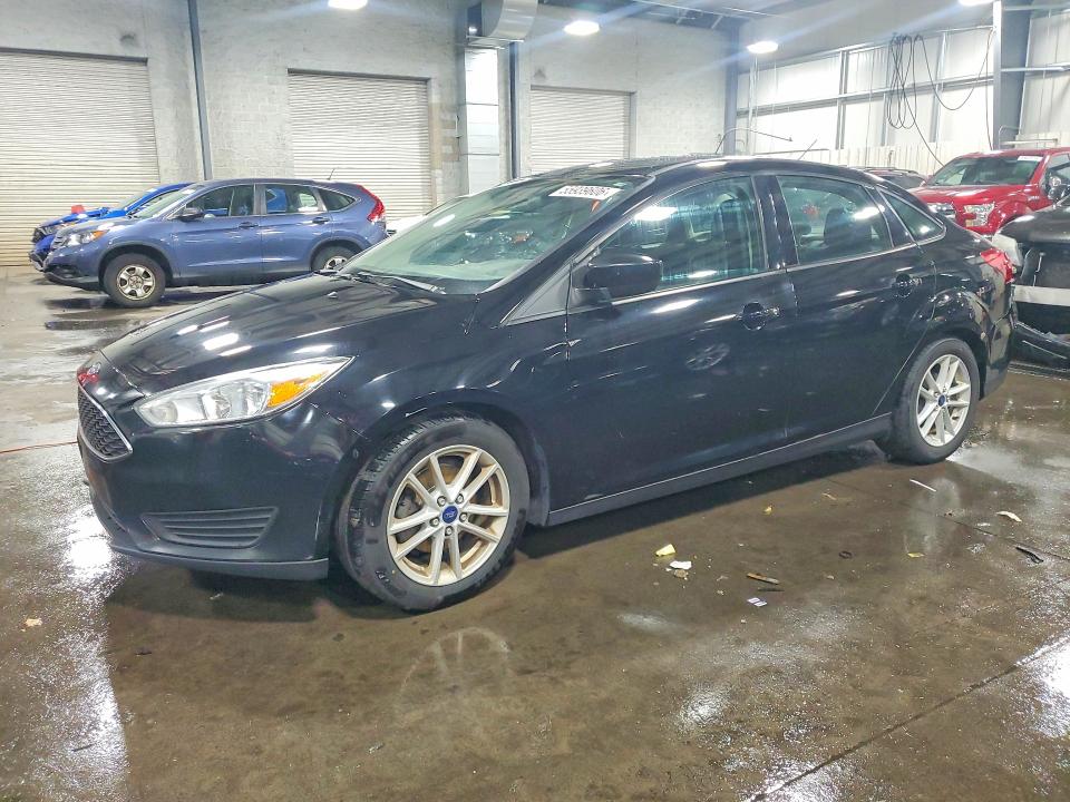 FORD FOCUS 2018 with VIN 1FADP3F2XJL211297 - Photo from auction