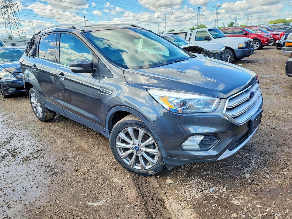Photo 4 from auction – 2018 FORD ESCAPE with VIN 1FMCU9J95JUD34890