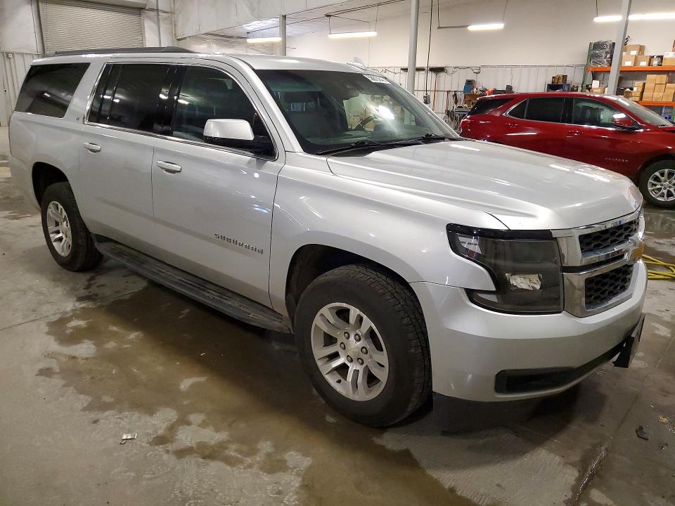 Photo 4 from auction – 2019 CHEVROLET SUBURBAN with VIN 1GNSKHKC4KR387702