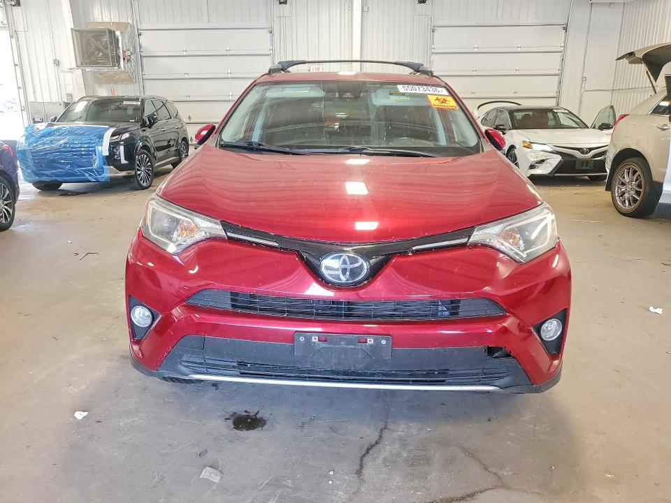 Photo 5 from auction – 2018 TOYOTA RAV4 with VIN JTMRFREV7JD256807