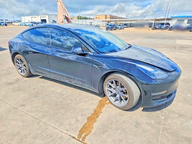 Photo 4 from auction – 2023 TESLA MODEL 3 with VIN 5YJ3E1EA8PF662118