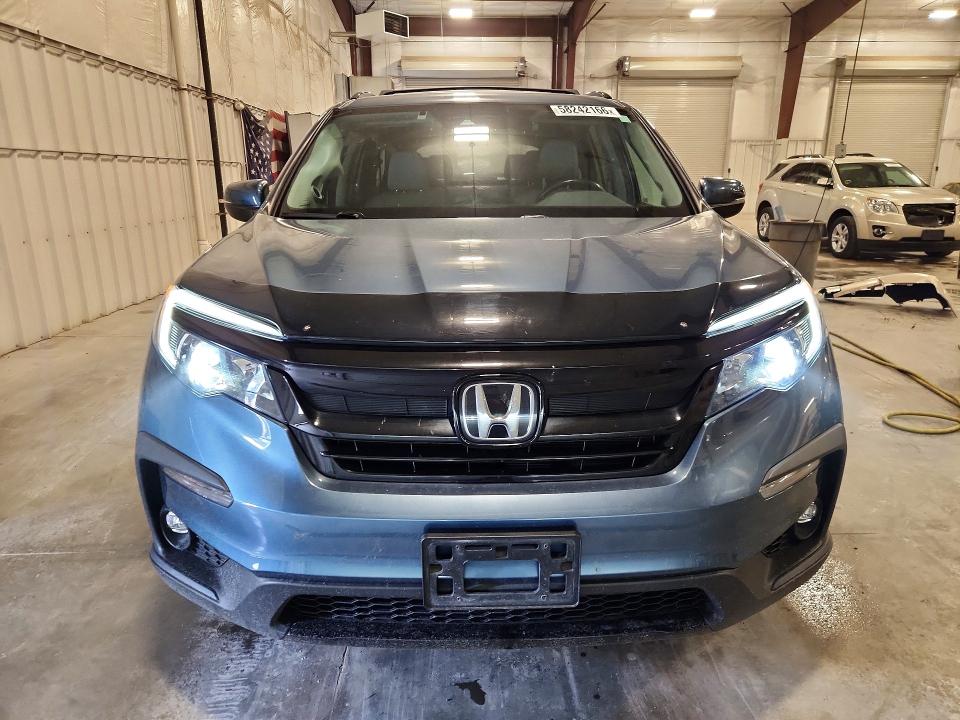 Photo 5 from auction – 2021 HONDA PILOT with VIN 5FNYF6H2XMB011802