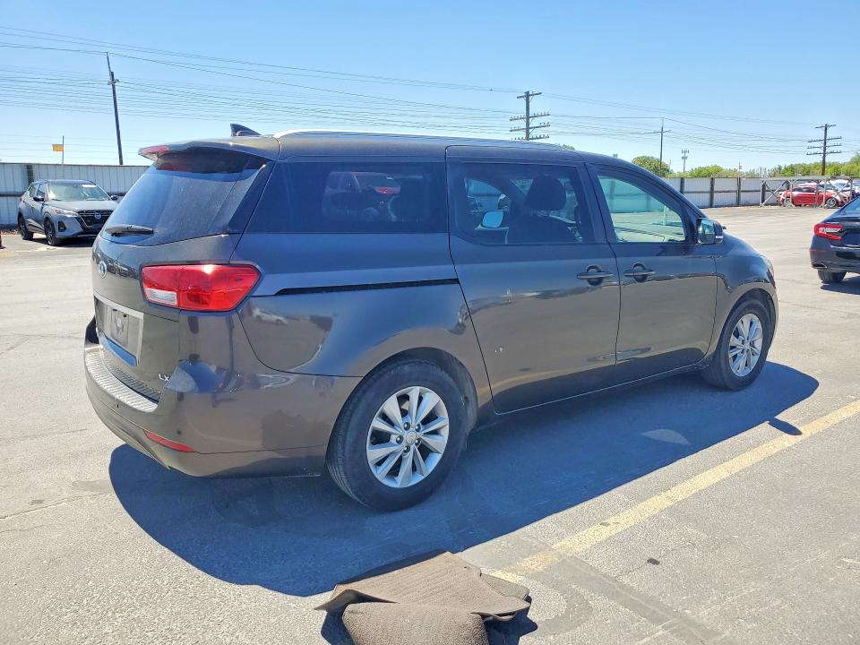 Photo 3 from auction – 2015 KIA SEDONA with VIN KNDMB5C10F6033681