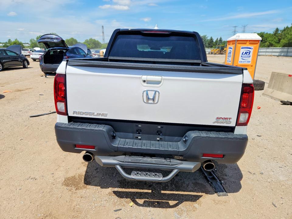 Photo 6 from auction – 2023 HONDA RIDGELINE with VIN 5FPYK3F14PB068318