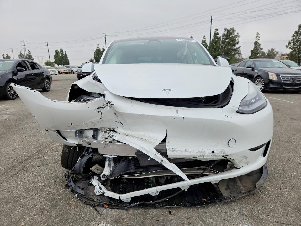 Photo 5 from auction – 2021 TESLA MODEL Y with VIN 5YJYGDEE5MF074645