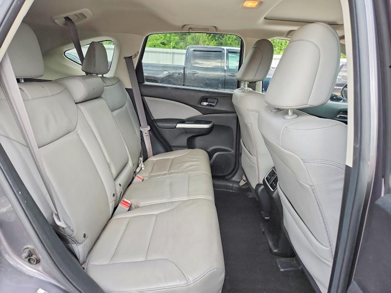 Photo 11 from auction – 2015 HONDA CR-V with VIN 2HKRM3H70FH518801
