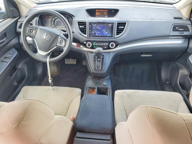 Photo 8 from auction – 2015 HONDA CR-V with VIN 3CZRM3H57FG700996