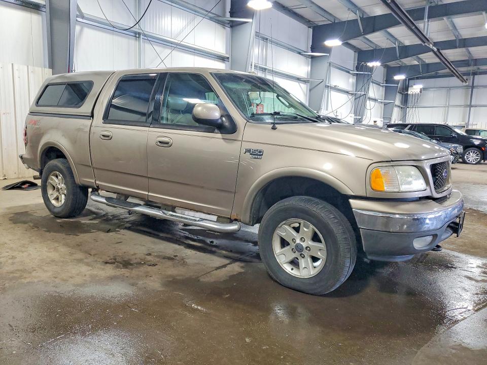 Photo 4 from auction – 2003 FORD F150 with VIN 1FTRW08L03KD72158