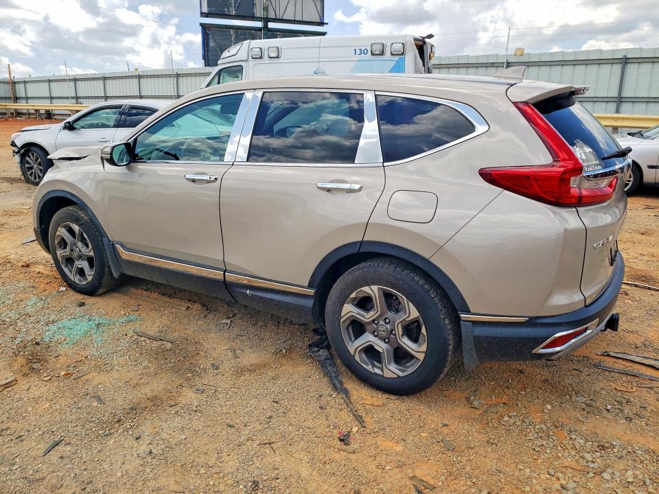 Photo 2 from auction – 2018 HONDA CR-V with VIN 2HKRW2H85JH698329