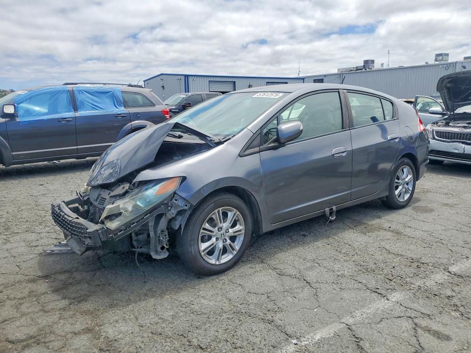 HONDA INSIGHT 2010 with VIN JHMZE2H79AS010858 - Photo from auction