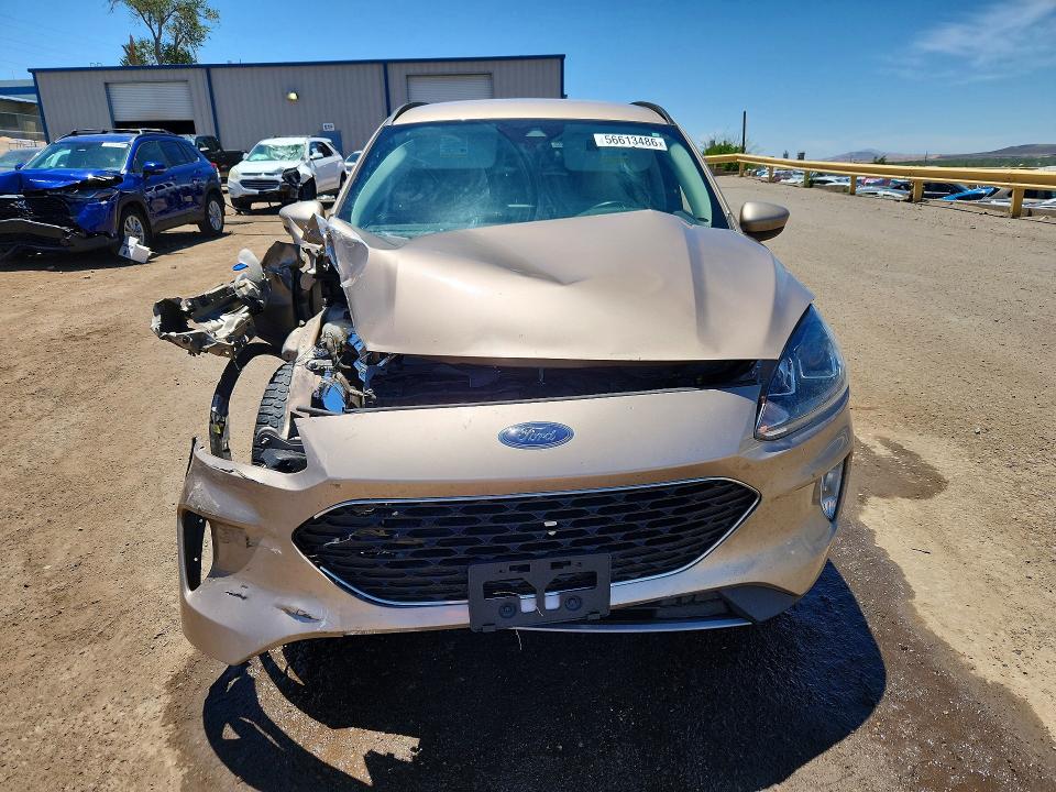 Photo 5 from auction – 2021 FORD ESCAPE with VIN 1FMCU0H68MUB05079