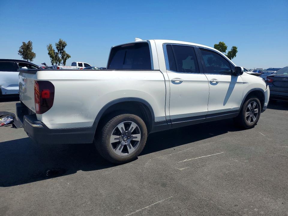 Photo 3 from auction – 2019 HONDA RIDGELINE with VIN 5FPYK3F57KB010411
