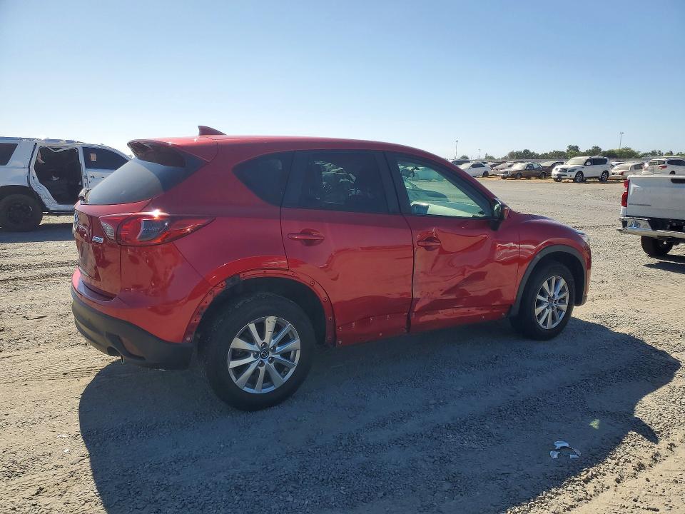 Photo 3 from auction – 2016 MAZDA CX-5 with VIN JM3KE2CY0G0895093